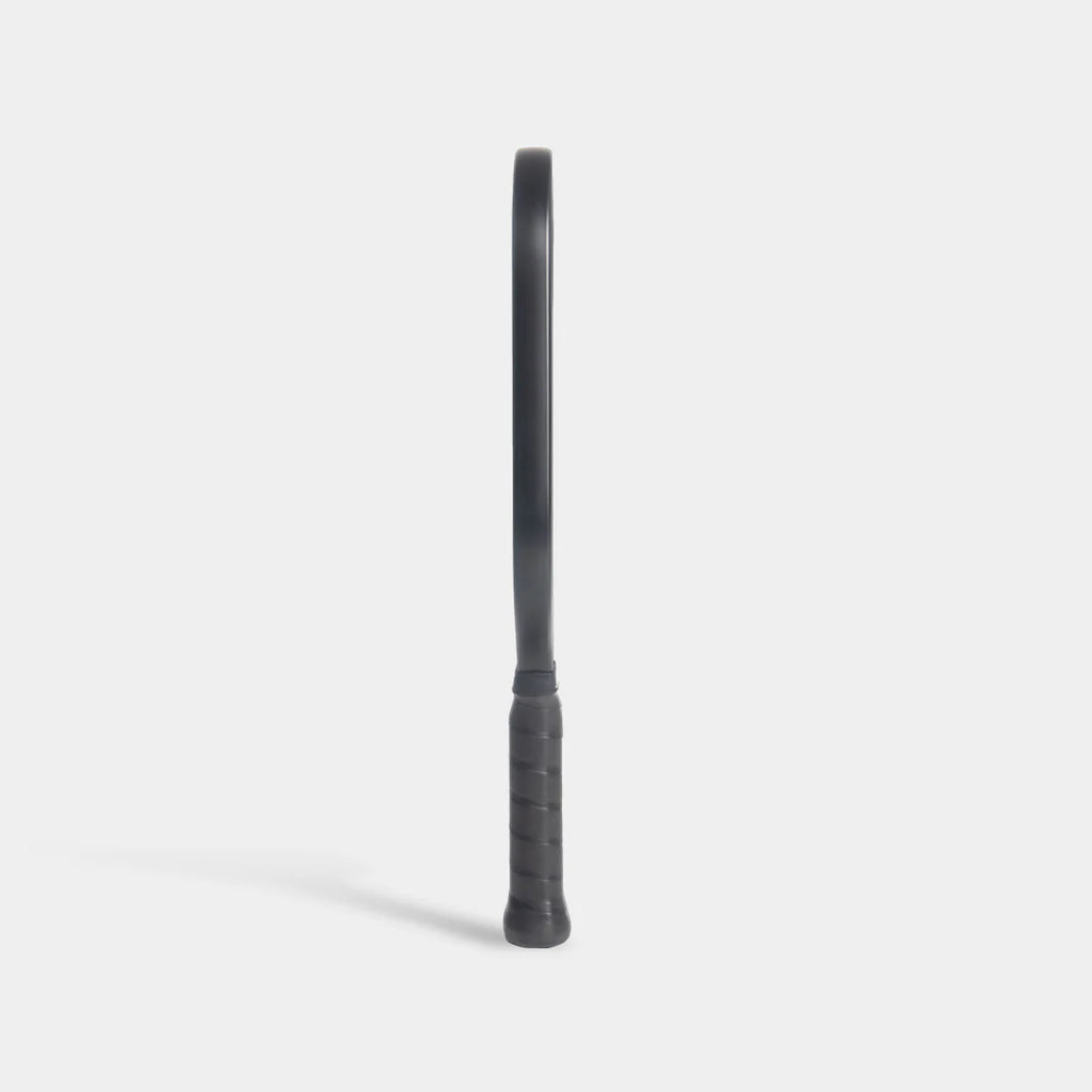 Luzz Pro Cannon pickleball paddle, side-on, all black, on a light gray background