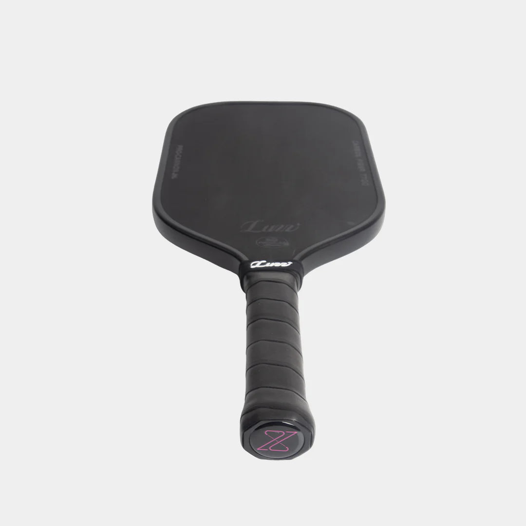 Luzz Pro Cannon pickleball paddle, all black, tilted downwards, on a light gray background