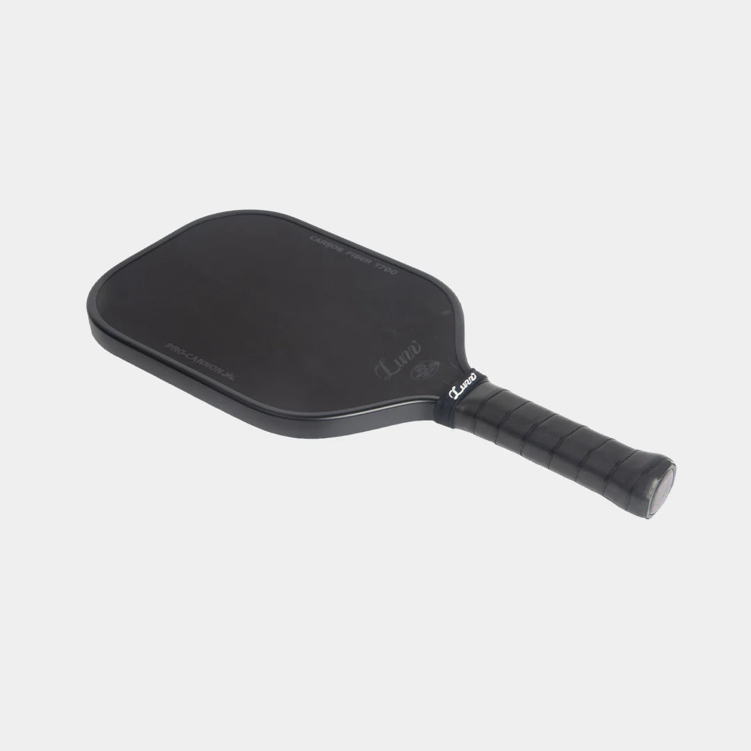 Luzz Pro Cannon pickleball paddle, angled slightlty to the left on a light gray background